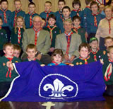 Robert McCrone and Sammy Hay surrounded by some of the scouts of today