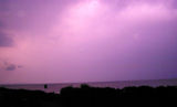 The River Clyde lights up under a flash of lightning